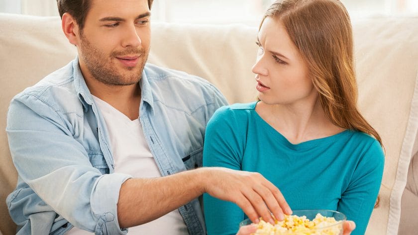couple eating popcorn ss186413939